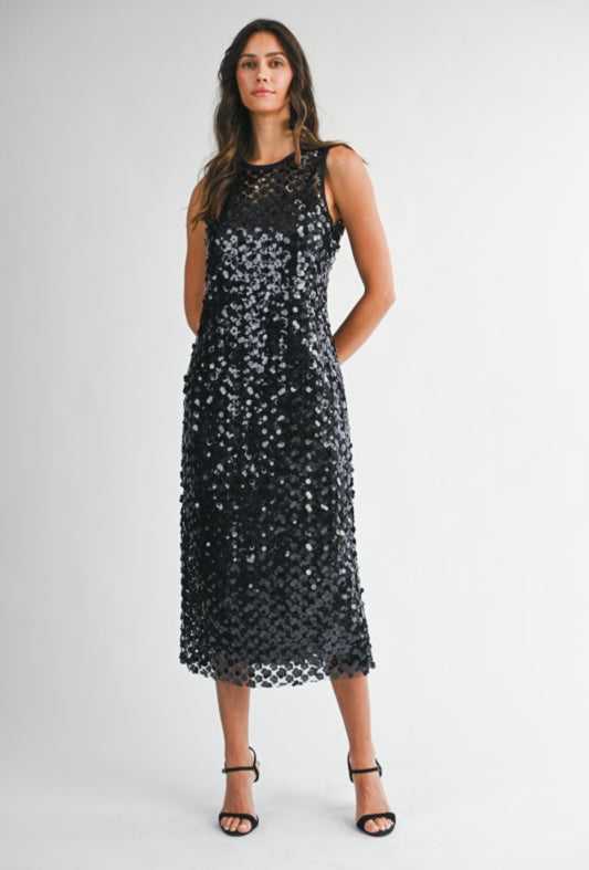 Elegant black sequin dress, sleeveless, mid-length, perfect for parties and special occasions.