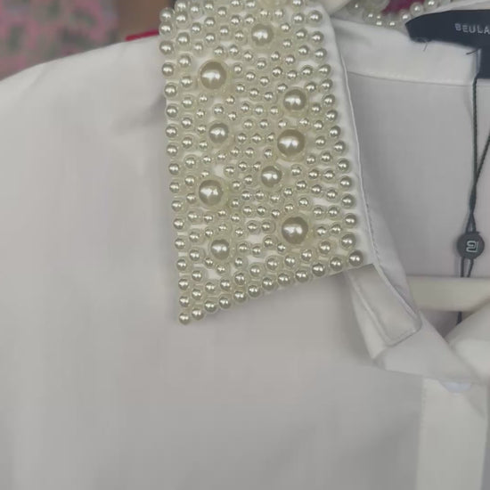 Elegant white shirt with embellished pearl collar for a chic, stylish look.