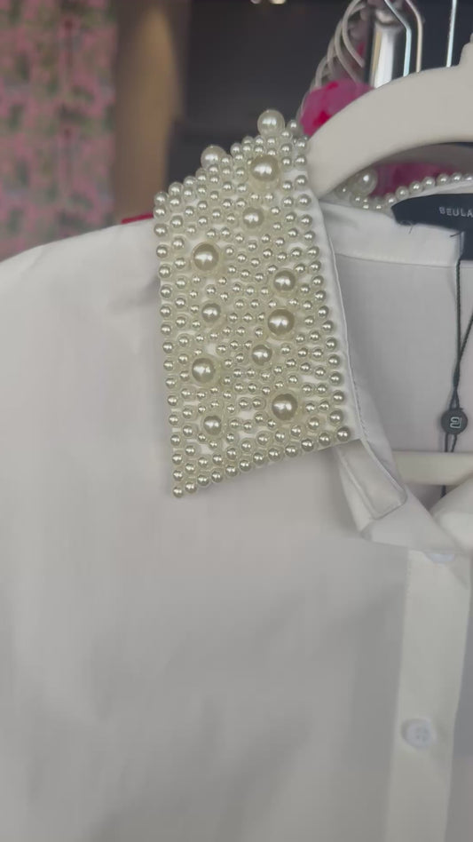 Elegant white shirt with embellished pearl collar for a chic, stylish look.