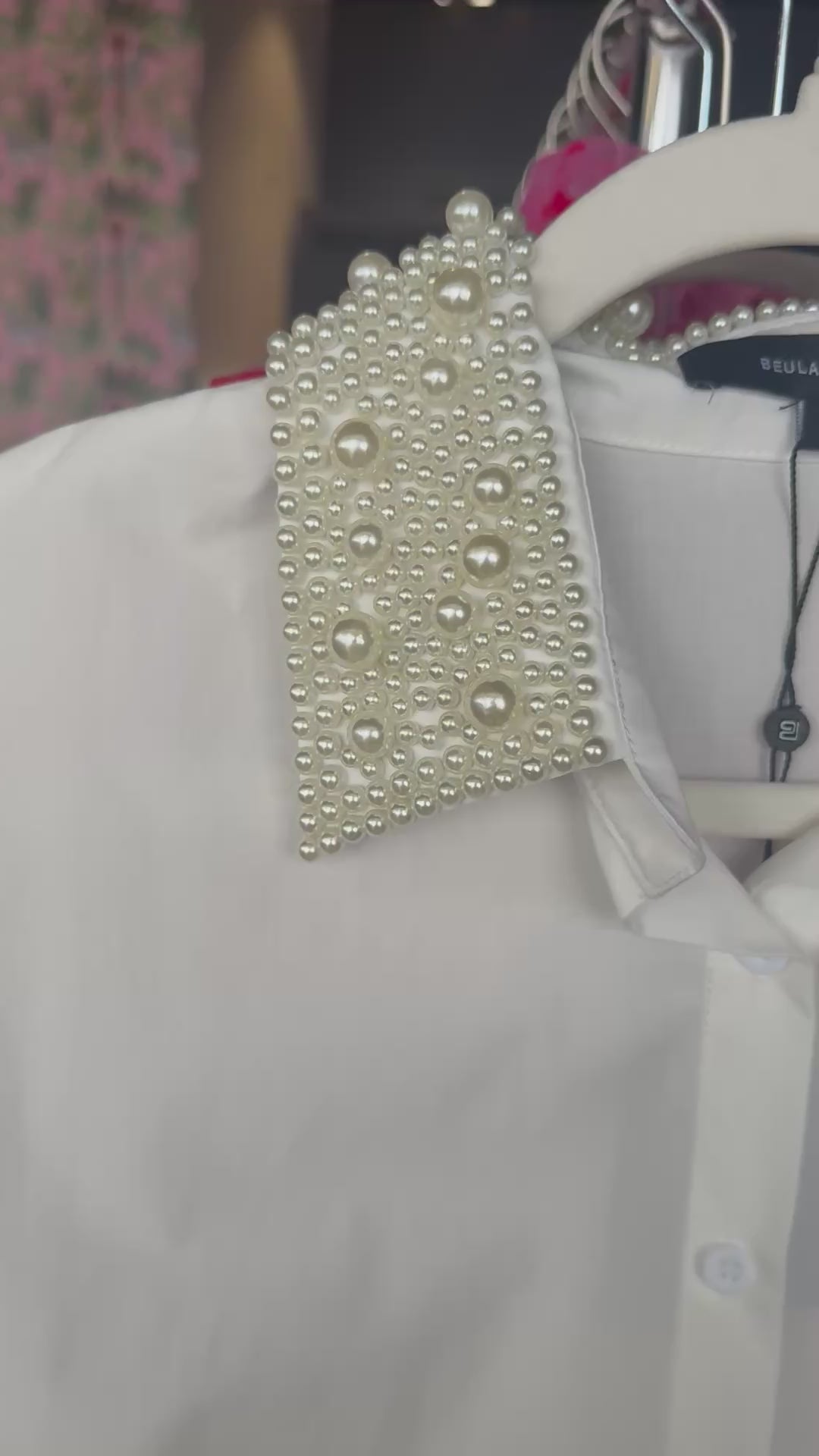 Elegant white shirt with embellished pearl collar for a chic, stylish look.